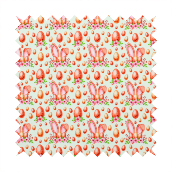 This fabric features a warm, watercolour-style Easter pattern on a very pale mint-green background. The design is rich in texture and soft tones, giving it a cosy and traditional holiday feel.