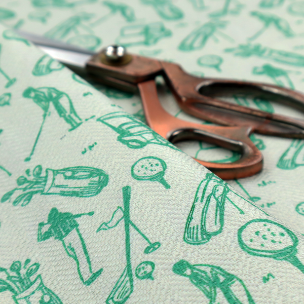 A repeating fabric pattern featuring hand-sketched green illustrations of golf carts, golfers, golf bags, golf balls on tees, and flags on a light mint-green background.