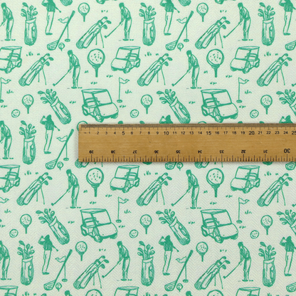 A repeating fabric pattern featuring hand-sketched green illustrations of golf carts, golfers, golf bags, golf balls on tees, and flags on a light mint-green background.