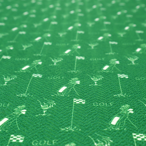 A repeating fabric pattern on a solid emerald green background, featuring small white icons of golf bags, checked flags, and the word 'GOLF' in a clean, sans-serif font.
