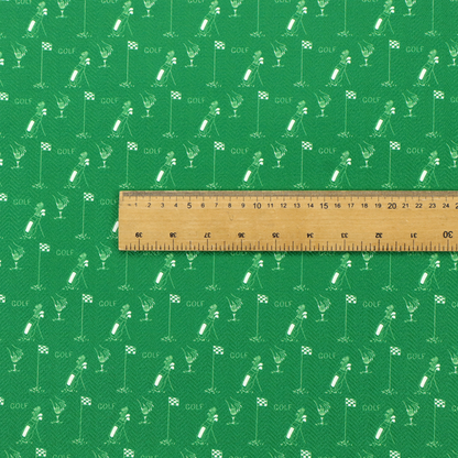 A repeating fabric pattern on a solid emerald green background, featuring small white icons of golf bags, checked flags, and the word 'GOLF' in a clean, sans-serif font.