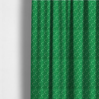 The fabric used to create these made-to-measure curtains is a  repeating fabric pattern on a solid emerald green background, featuring small white icons of golf bags, checked flags, and the word 'GOLF' in a clean, sans-serif font.