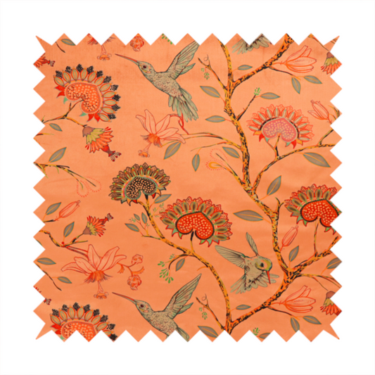 A vibrant botanical fabric pattern featuring detailed hummingbirds in flight among lush tropical flowers.