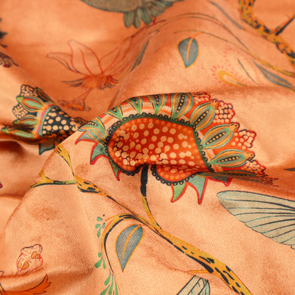 A vibrant botanical fabric pattern featuring detailed hummingbirds in flight among lush tropical flowers.