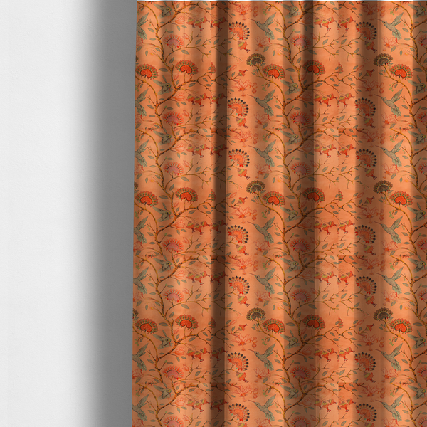 The fabric used to create these made-to-measure curtains is a vibrant botanical fabric pattern featuring detailed hummingbirds in flight among lush tropical flowers.