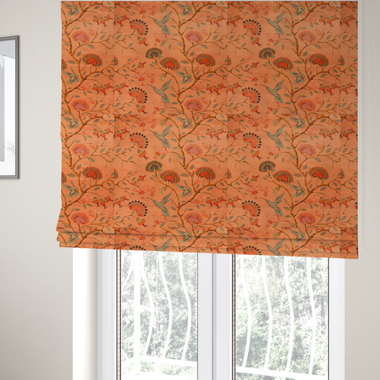 The fabric used to create these Roman blinds is a vibrant botanical fabric pattern featuring detailed hummingbirds in flight among lush tropical flowers.
