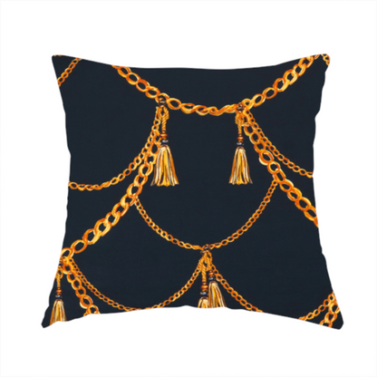 The fabric used to create this handmade cushion is a luxury fashion-inspired fabric on a deep navy-black background. The design features elegant, draped golden chains arranged in a repeating scallop or 'swag' pattern, accented by highly detailed golden silk tassels suspended from ornate beaded cords.