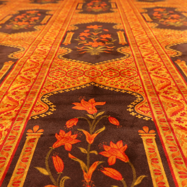 A vertical stripe fabric featuring an intricate Mughal-inspired architectural pattern. The design displays orange lily bouquets enclosed within scalloped 'Palace Gate' arches, separated by decorative geometric borders in saffron, terracotta, and deep chocolate brown.