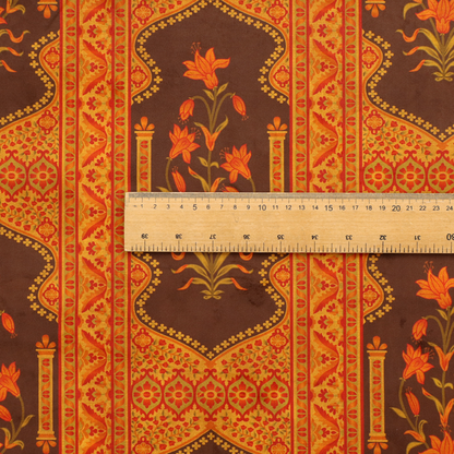 A vertical stripe fabric featuring an intricate Mughal-inspired architectural pattern. The design displays orange lily bouquets enclosed within scalloped 'Palace Gate' arches, separated by decorative geometric borders in saffron, terracotta, and deep chocolate brown.