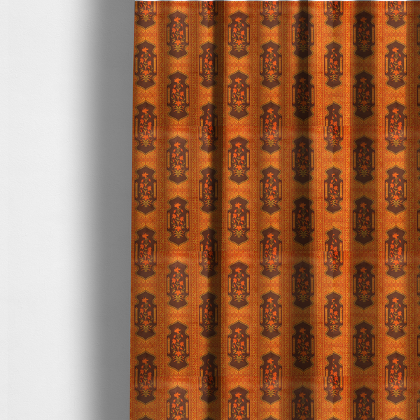 The fabric used to create these made-to-measure curtains is a vertical stripe fabric featuring an intricate Mughal-inspired architectural pattern. The design displays orange lily bouquets enclosed within scalloped 'Palace Gate' arches, separated by decorative geometric borders in saffron, terracotta, and deep chocolate brown.