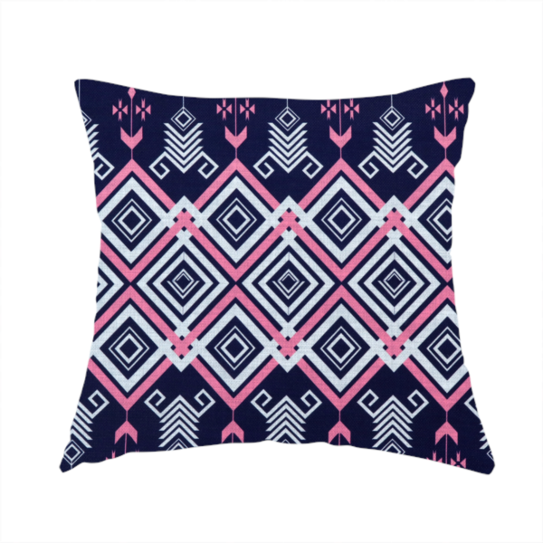 The fabric used to create this handmade cushion is a sharp and sophisticated geometric fabric on a deep midnight navy background. The design features a prominent central horizontal band of interlocking diamonds in crisp white and neon pink, framed by intricate, vertical 'spear-like' motifs and delicate diamond accents that evoke a modern, high-contrast Ikat or tribal-inspired aesthetic.