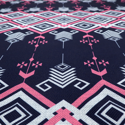 A sharp and sophisticated geometric fabric on a deep midnight navy background. The design features a prominent central horizontal band of interlocking diamonds in crisp white and neon pink, framed by intricate, vertical 'spear-like' motifs and delicate diamond accents that evoke a modern, high-contrast Ikat or tribal-inspired aesthetic.