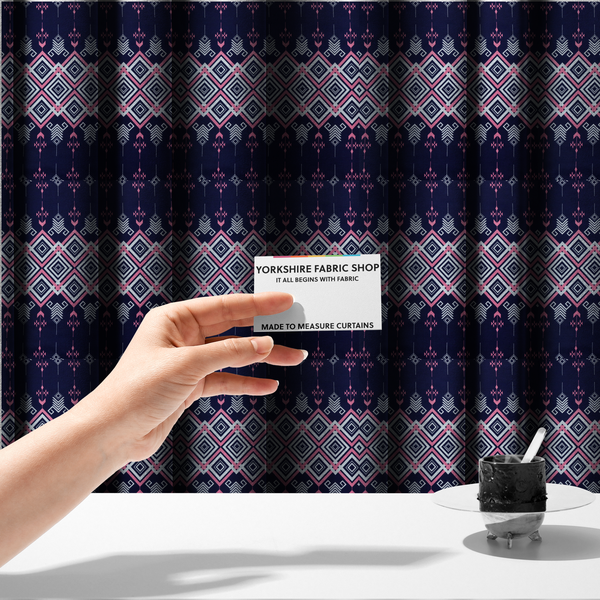 The fabric used to create these made-to-measure curtains is a sharp and sophisticated geometric fabric on a deep midnight navy background. The design features a prominent central horizontal band of interlocking diamonds in crisp white and neon pink, framed by intricate, vertical 'spear-like' motifs and delicate diamond accents that evoke a modern, high-contrast Ikat or tribal-inspired aesthetic.