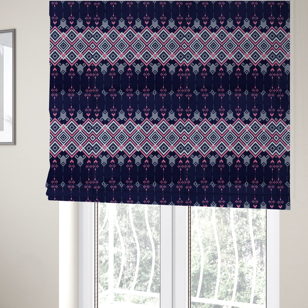 The fabric used to create these Roman blinds is a sharp and sophisticated geometric fabric on a deep midnight navy background. The design features a prominent central horizontal band of interlocking diamonds in crisp white and neon pink, framed by intricate, vertical 'spear-like' motifs and delicate diamond accents that evoke a modern, high-contrast Ikat or tribal-inspired aesthetic.