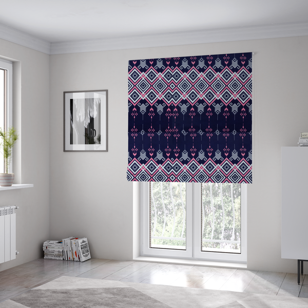 The fabric used to create these Roman blinds is a sharp and sophisticated geometric fabric on a deep midnight navy background. The design features a prominent central horizontal band of interlocking diamonds in crisp white and neon pink, framed by intricate, vertical 'spear-like' motifs and delicate diamond accents that evoke a modern, high-contrast Ikat or tribal-inspired aesthetic.