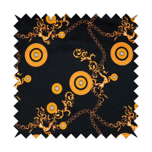 A luxury baroque-style fabric on a black ground featuring a trellis of golden chains interspersed with ornate sun-medallions and amber floral scrolls.