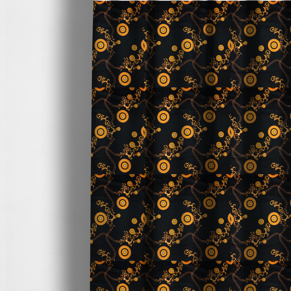 The fabric used to create these made-to-measure curtains is a luxury baroque-style fabric on a black ground featuring a trellis of golden chains interspersed with ornate sun-medallions and amber floral scrolls.