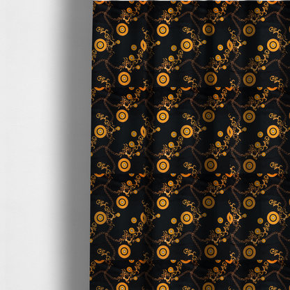 The fabric used to create these made-to-measure curtains is a luxury baroque-style fabric on a black ground featuring a trellis of golden chains interspersed with ornate sun-medallions and amber floral scrolls.