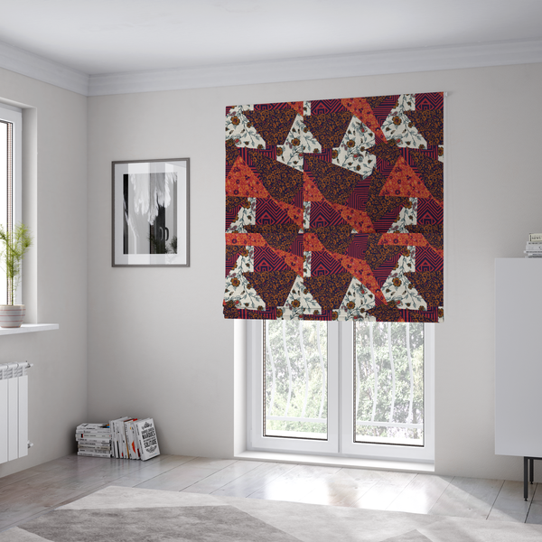 The fabric used to create these Roman blinds is a rich and layered patchwork fabric featuring a collage of sharp, angular shards and geometric fragments. The design blends diverse motifs including vintage-style burnt orange florals, delicate cream botanical vines with paisley accents, and bold navy and terracotta linear chevrons, creating a warm, textured, and maximalist mosaic aesthetic.
