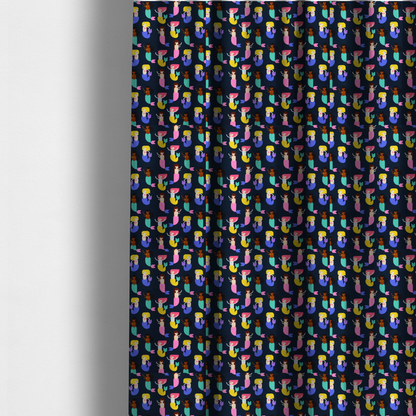 The fabric used to create these made-to-measure curtains is a  fun and vibrant children's fabric on a deep midnight-navy background. The pattern features a diverse cast of illustrated mermaids with various skin tones, hair colours (pink, blonde, brown), and colourful tails in shades of mint, yellow, pink, and purple, arranged in a cheerful repeating grid.