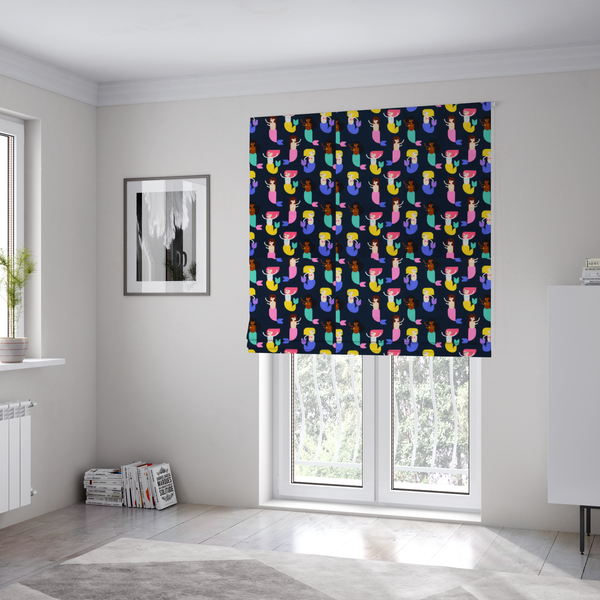 The fabric used to create these Roman blinds is a fun and vibrant children's fabric on a deep midnight-navy background. The pattern features a diverse cast of illustrated mermaids with various skin tones, hair colours (pink, blonde, brown), and colourful tails in shades of mint, yellow, pink, and purple, arranged in a cheerful repeating grid.