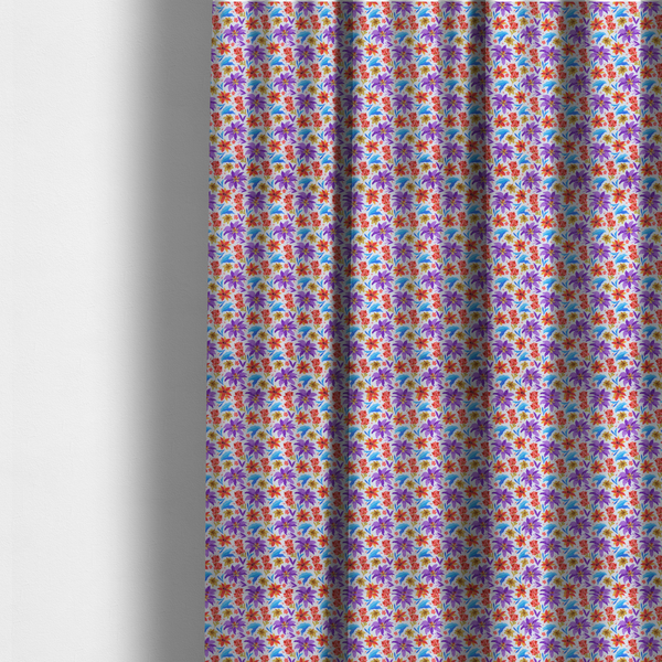 The fabric used to create these made-to-measure curtains is a bright and airy botanical fabric on a clean white background. The design features a scattered, high-saturation mix of large violet lilies, fiery orange-red poinsettias, and electric blue palm-like fronds, accented by delicate pink blossoms and olive green foliage in a lively, contemporary tropical repeat.