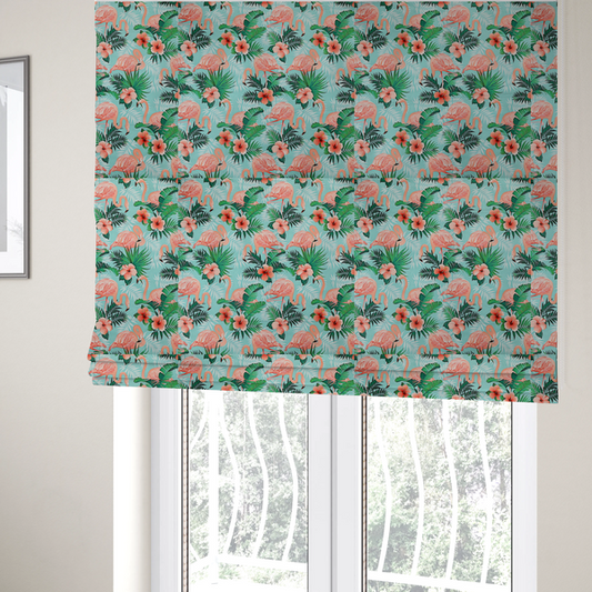The fabric used to create these Roman blinds is a vibrant tropical pattern featuring pink flamingos, orange hibiscus flowers, and lush green palm leaves on a bright turquoise background.