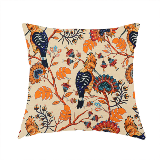 The fabric used to created these handmade cushions is a striking botanical pattern featuring crested Hoopoe birds perched on winding orange branches with teal and terracotta floral blossoms on a warm cream background.
