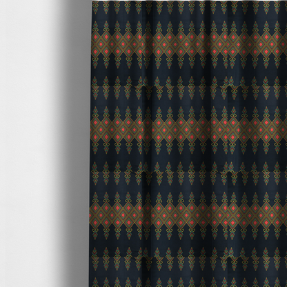 The fabric used to create these made-to-measure curtains is a geometric tribal pattern featuring red, yellow, and green diamonds and linear motifs on a dark charcoal-black fabric background.