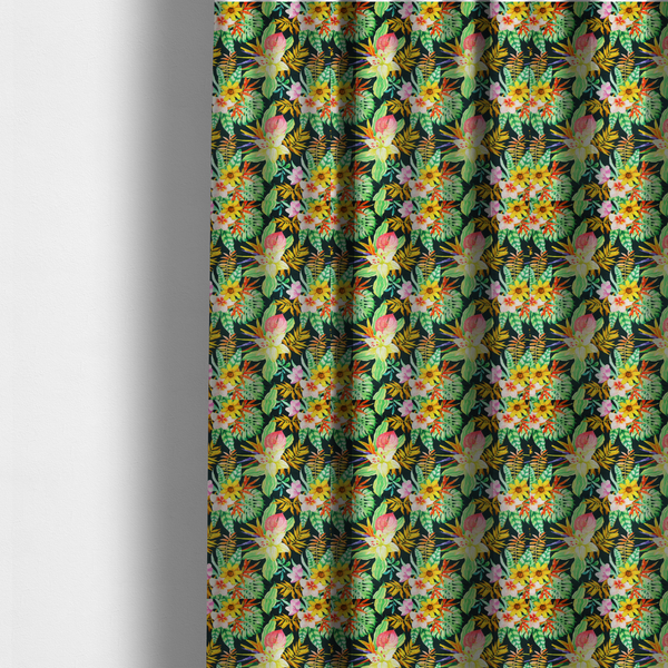The fabric used to create these made-to-measure curtains is a vivid tropical botanical pattern featuring lilies, birds of paradise, and pink plumeria blossoms set against lush green leaves on a deep midnight black background.