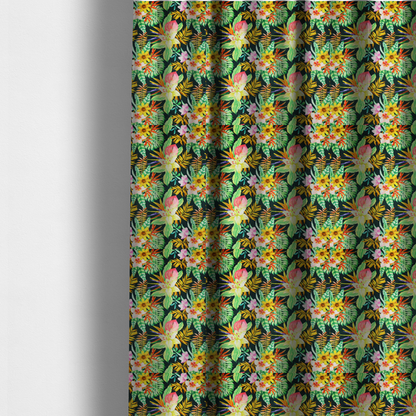 The fabric used to create these made-to-measure curtains is a vivid tropical botanical pattern featuring lilies, birds of paradise, and pink plumeria blossoms set against lush green leaves on a deep midnight black background.