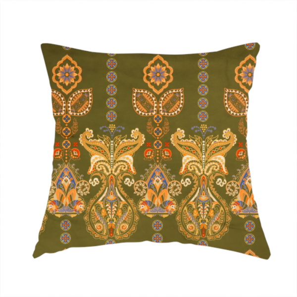 The fabric used to create these handmade cushions is a intricate, bohemian-inspired pattern featuring ornate paisley motifs and stylized floral medallions in warm ochre, terracotta, and cerulean blue on a rich olive green background.