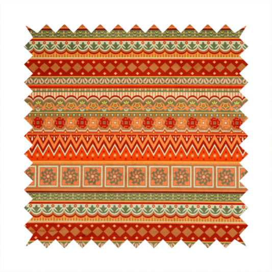 A vibrant, tribal-inspired geometric pattern featuring horizontal bands of zig-zags, floral tiles, and ornamental borders in a warm palette of terracotta, burnt orange, and sage green.