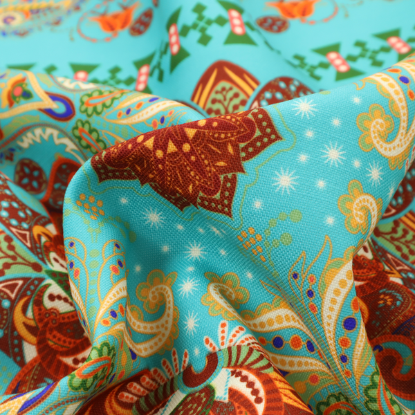 A vibrant and detailed ornamental fabric on a bright turquoise-azure background. The design features a large, symmetrical Persian-style medallion composed of warm terracotta, orange, and gold paisley motifs, framed by vertical geometric borders and diamond-shaped emblems in emerald green and ivory.