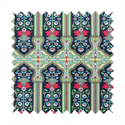 This fabric is a highly detailed, symmetrical textile pattern with a dark navy blue background. The design consists of repeating vertical floral motifs arranged in columns, separated by narrow, light-coloured striped bands.