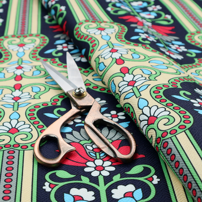 This fabric is a highly detailed, symmetrical textile pattern with a dark navy blue background. The design consists of repeating vertical floral motifs arranged in columns, separated by narrow, light-coloured striped bands.