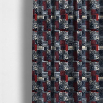 The fabric used to create these made-to-measure curtains is a patchwork-style fabric print featuring a repetitive arrangement of square and rectangular blocks. Each block is filled with intricate navy blue, red, and cream-coloured bandana and paisley motifs, creating a dense, geometric, and traditional textile pattern.