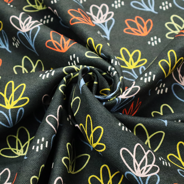 A black fabric print featuring a modern, repeating pattern of colourful doodle-style floral outlines. The flowers are drawn in vibrant yellow, orange, pink, and light blue, accented by small white dash marks, creating a playful and artistic aesthetic.