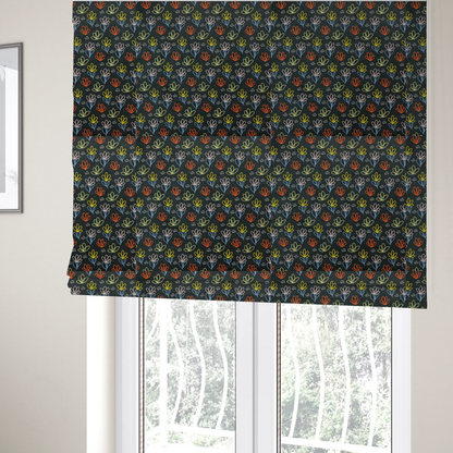 The fabric used to create these Roman blinds is a black fabric print featuring a modern, repeating pattern of colourful doodle-style floral outlines. The flowers are drawn in vibrant yellow, orange, pink, and light blue, accented by small white dash marks, creating a playful and artistic aesthetic.