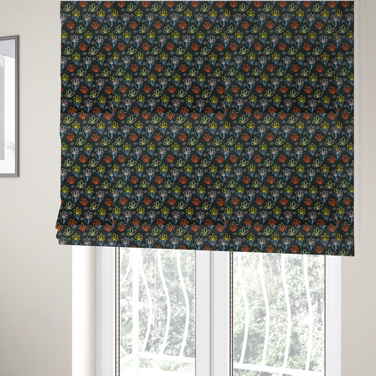 The fabric used to create these Roman blinds is a black fabric print featuring a modern, repeating pattern of colourful doodle-style floral outlines. The flowers are drawn in vibrant yellow, orange, pink, and light blue, accented by small white dash marks, creating a playful and artistic aesthetic.