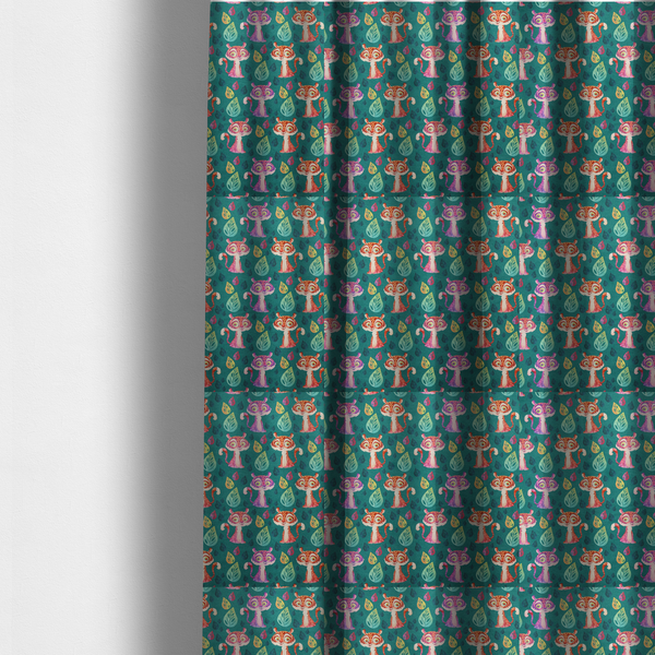 The fabric used to create these made-to-measure curtains is a teal fabric print featuring a whimsical, repeating pattern of cute, cartoon-style baby tigers and stylized leaves. The tigers are rendered in vibrant shades of pink, orange, and purple, while the leaves appear in varied hues, creating a playful and colourful jungle-themed aesthetic.