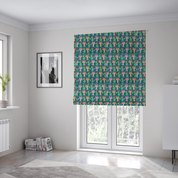 The fabric used to create these Roman blinds is a teal fabric print featuring a whimsical, repeating pattern of cute, cartoon-style baby tigers and stylized leaves. The tigers are rendered in vibrant shades of pink, orange, and purple, while the leaves appear in varied hues, creating a playful and colourful jungle-themed aesthetic.