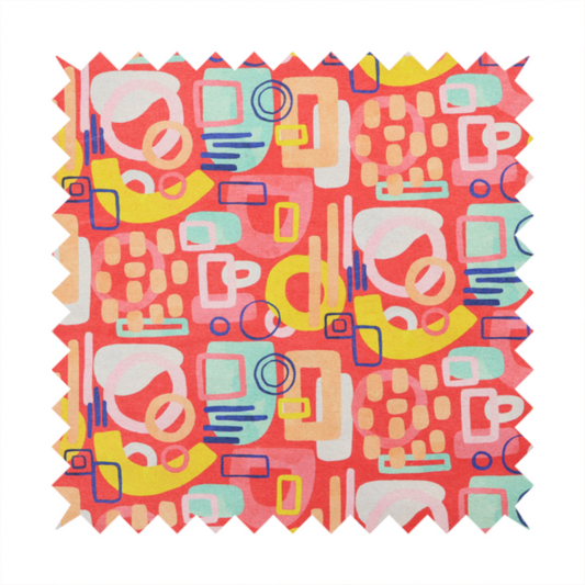 A vibrant fabric print featuring an abstract, mid-century modern design. The pattern consists of overlapping geometric shapes—circles, rectangles, and arches—in a lively palette of coral, bright yellow, teal, and soft peach on a coral-red background, creating a playful and retro aesthetic.