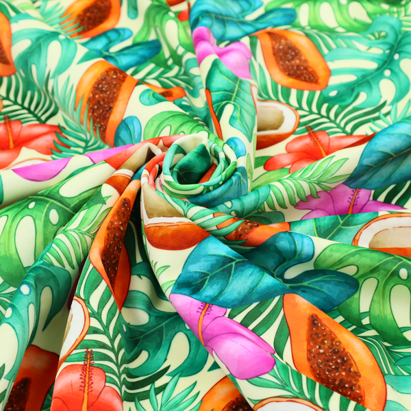 A lush, tropical-themed fabric print featuring a repeating pattern of halved papayas, coconuts, vibrant red and pink hibiscus flowers, and various green palm and monstera leaves against a light cream-colored background. The design has a hand-painted, watercolour style, creating a fresh, summery, and vacation-inspired aesthetic.
