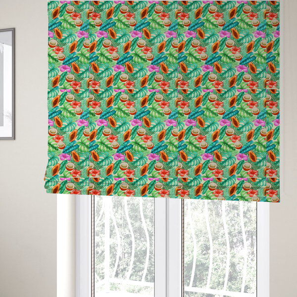 The fabric used to create these Roman blinds is a lush, tropical-themed fabric print featuring a repeating pattern of halved papayas, coconuts, vibrant red and pink hibiscus flowers, and various green palm and monstera leaves against a light cream-colored background. The design has a hand-painted, watercolour style, creating a fresh, summery, and vacation-inspired aesthetic.
