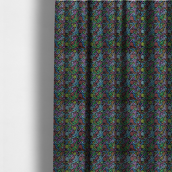 The fabric used to create these made-to-measure curtains is a black fabric print featuring a retro, 90s-inspired pattern of colourful, hand-drawn-style doodles. The design includes vibrant neon swirls, squiggles, and V-shapes in shades of pink, yellow, blue, orange, and green, creating a nostalgic, high-energy, and playful aesthetic.