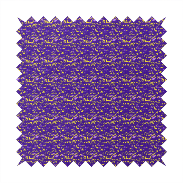 A vibrant fabric print featuring a dense, abstract pattern of bright yellow, sharp-edged shapes scattered across a deep, solid purple background. The design creates a textured, dynamic, and modern look.