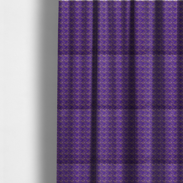 The fabric used to create these made-to-measure curtains is a vibrant fabric print featuring a dense, abstract pattern of bright yellow, sharp-edged shapes scattered across a deep, solid purple background. The design creates a textured, dynamic, and modern look.