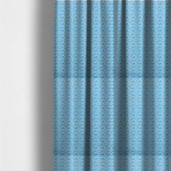 The fabric used to create these made-to-measure curtains is a light blue fabric print featuring a repetitive, minimalist pattern of tiny whales and scattered bubbles. The design uses varying shades of blue to create a soft, calming, and playful aquatic aesthetic.