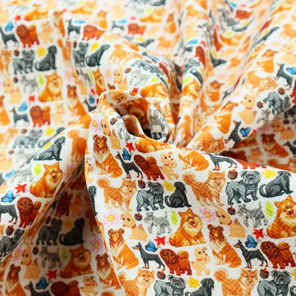 Whimsical fabric pattern featuring a tight, repeating grid of colourful cartoon dogs of various breeds, including Pugs, Chows, and Retrievers, on a light off-white background.